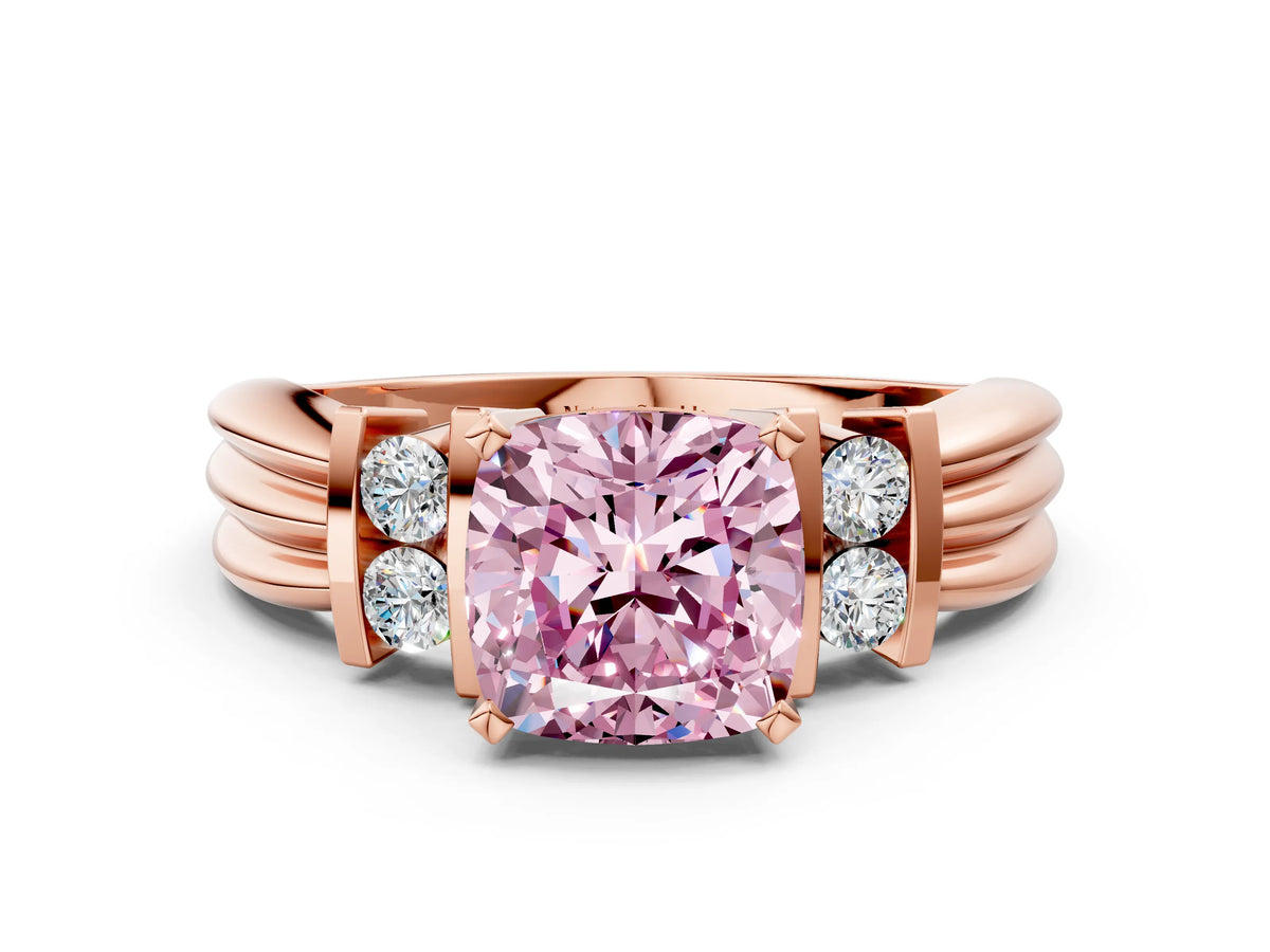Three-Stone Fancy Pink Cushion Cut Diamond Channel Set Ring in Rose gold with Bar Prongs