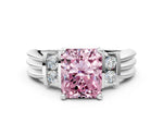 Three-Stone Fancy Pink Radiant Cut Diamond Channel Set Ring in Platinum with Bar Prongs_12