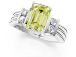Three-Stone Fancy Yellow Emerald Cut Diamond Channel Set Ring in White gold with Bar Prongs_1