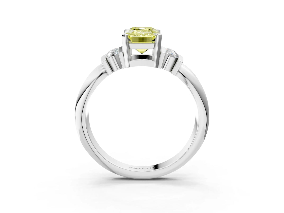 Three-Stone Fancy Yellow Emerald Cut Diamond Channel Set Ring in White gold with Bar Prongs_3