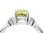 Three-Stone Fancy Yellow Emerald Cut Diamond Channel Set Ring in White gold with Bar Prongs_4