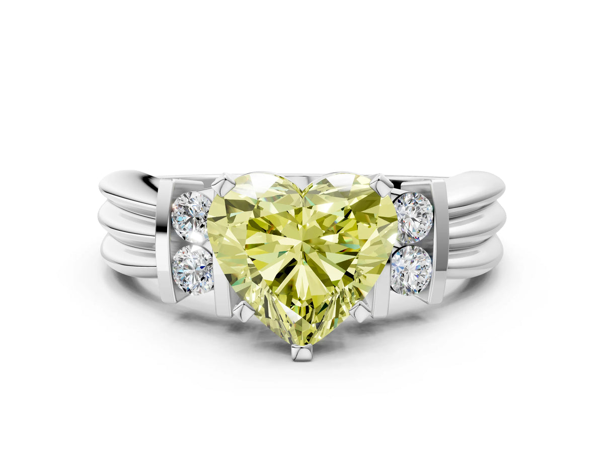 Three-Stone Fancy Yellow Heart Cut Diamond Channel Set Ring in White gold with Bar Prongs