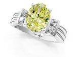 Three-Stone Fancy Yellow Oval Cut Diamond Channel Set Ring in White gold with Bar Prongs_1