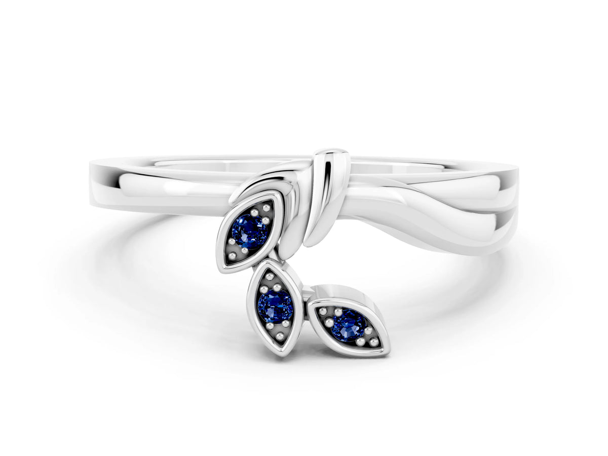 Three-Stone Round Blue Sapphire Leaf Bypass Ring in Platinum with Bezel Setting