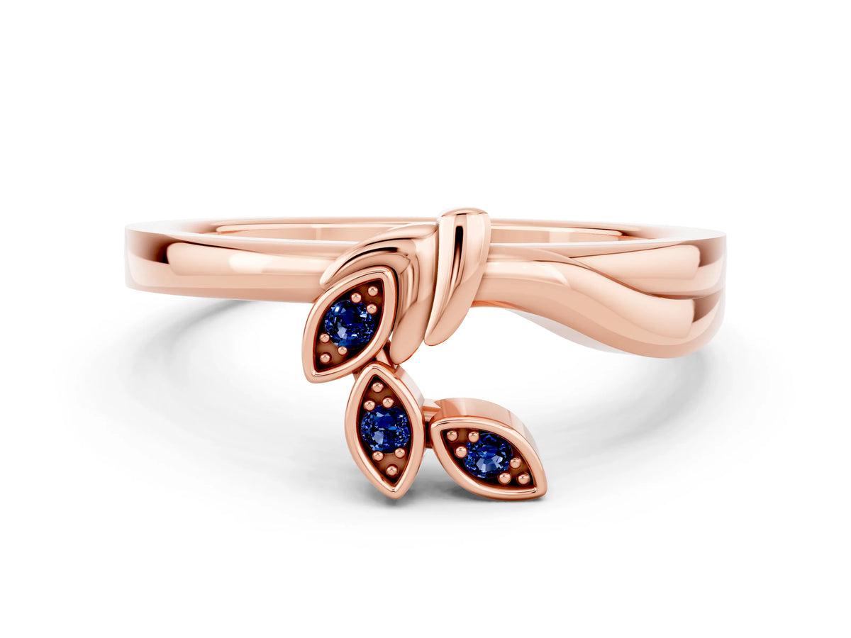 Three-Stone Round Blue Sapphire Leaf Bypass Ring in Rose gold with Bezel Setting