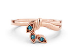 Three-Stone Round Blue Topaz Leaf Bypass Ring in Rose gold with Bezel Setting