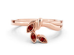 Three-Stone Round Ruby Leaf Bypass Ring in Rose gold with Bezel Setting