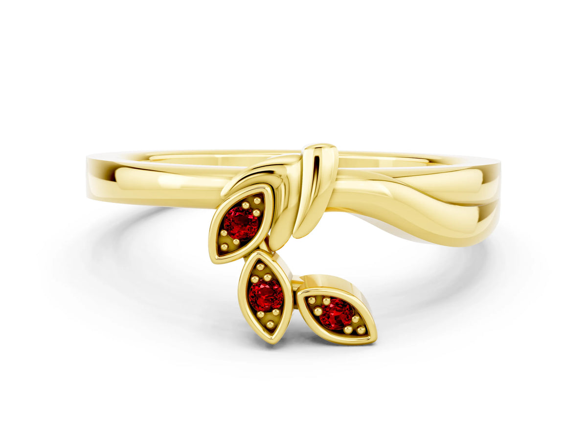 Three-Stone Round Ruby Leaf Bypass Ring in Yellow gold with Bezel Setting