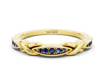 Twisted Marquise Blue Sapphire Pavé Band in Yellow gold with Shared Prong Setting