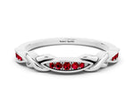 Twisted Marquise Ruby Pavé Band in White gold with Shared Prong Setting