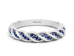 Twisted Pavé Round Blue Sapphire Eternity Band in White gold with Shared Prong Setting