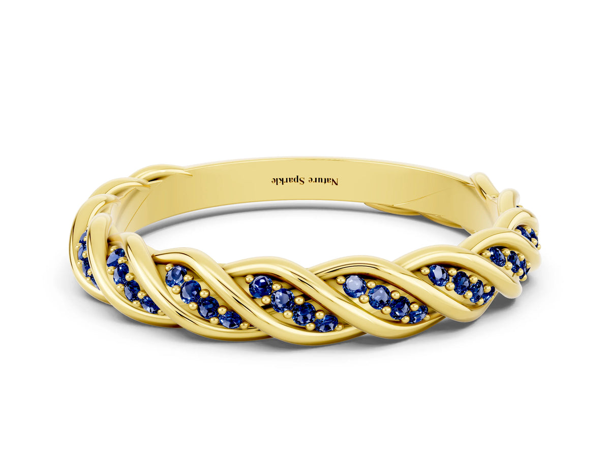 Twisted Pavé Round Blue Sapphire Eternity Band in Yellow gold with Shared Prong Setting