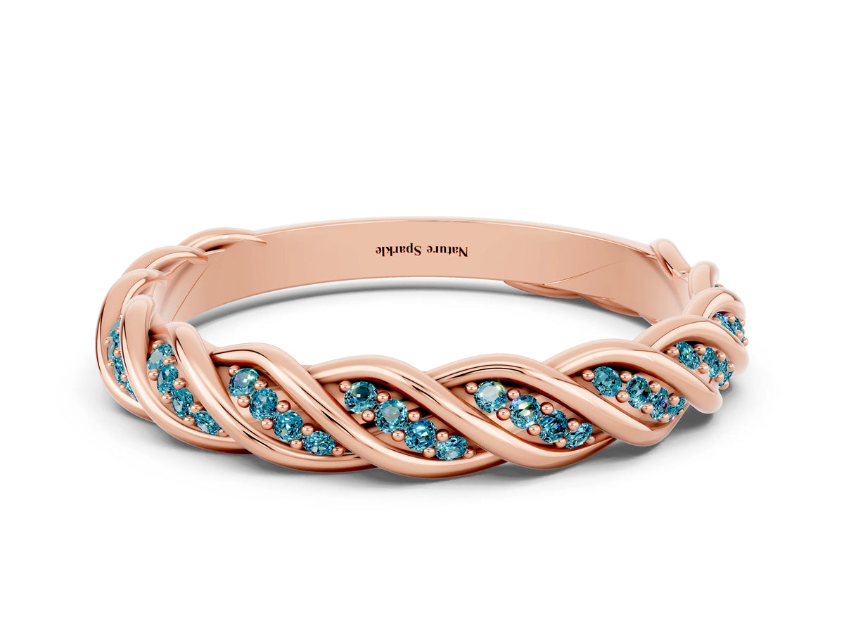 Twisted Pavé Round Blue Topaz Eternity Band in Rose gold with Shared Prong Setting