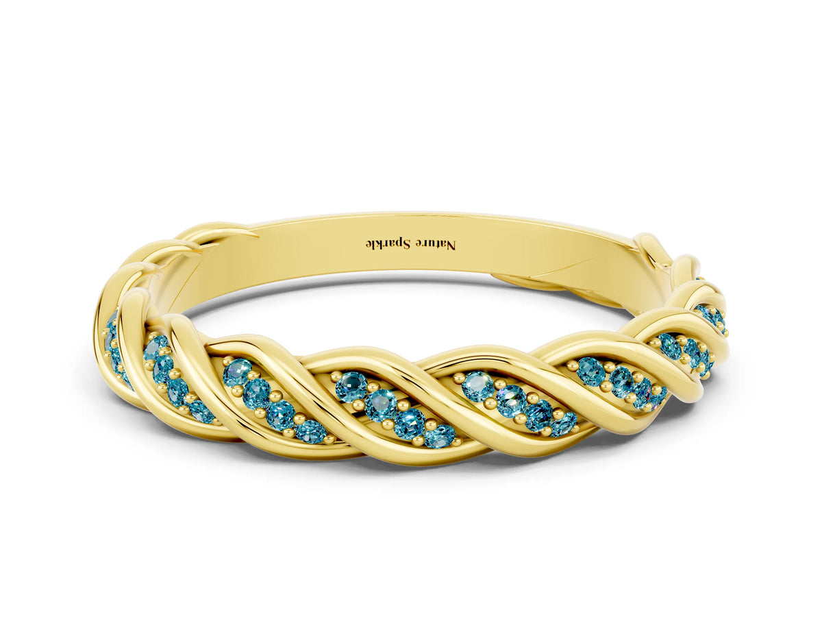 Twisted Pavé Round Blue Topaz Eternity Band in Yellow gold with Shared Prong Setting