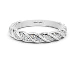 Twisted Pavé Round Moissanite Eternity Band in Platinum with Shared Prong Setting