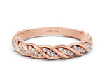 Twisted Pavé Round Moissanite Eternity Band in Rose gold with Shared Prong Setting