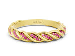 Twisted Pavé Round Pink Sapphire Eternity Band in Yellow gold with Shared Prong Setting