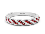 Twisted Pavé Round Ruby Eternity Band in White gold with Shared Prong Setting