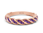 Twisted Pavé Round Tanzanite Eternity Band in Rose gold with Shared Prong Setting