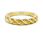 Twisted Pavé Round Yellow Sapphire Eternity Band in Yellow gold with Shared Prong Setting