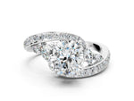 White gold Cushion Cut Solitaire with Pavé Twist Band and Four-Prong Setting