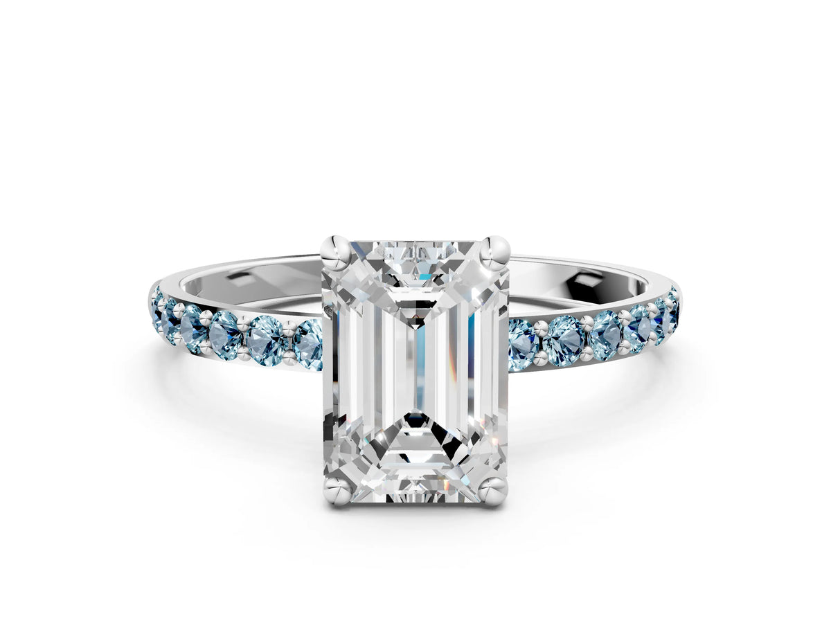 White gold Emerald Cut Diamond Solitaire Ring with Round Aquamarine Pavé Band and Prong Setting