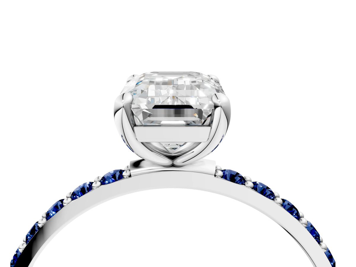 White gold Emerald Cut Diamond Solitaire Ring with Round Blue Sapphire Pavé Band and Prong Setting_4