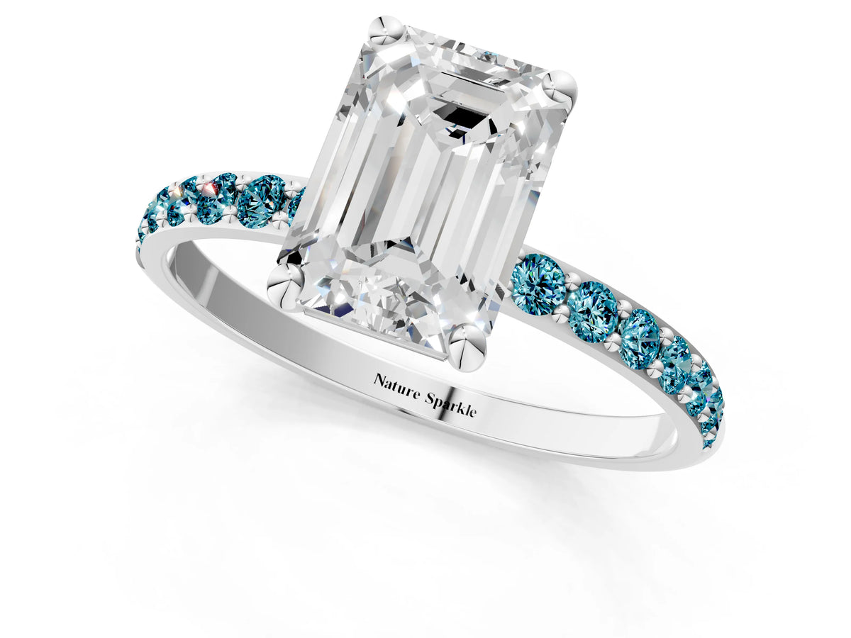 White gold Emerald Cut Diamond Solitaire Ring with Round Blue Topaz Pavé Band and Prong Setting_1