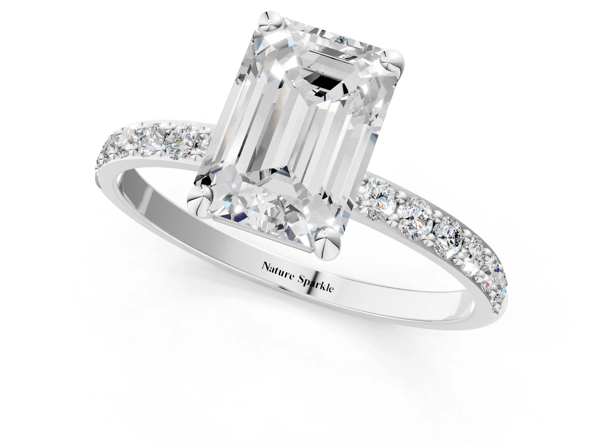 White gold Emerald Cut Diamond Solitaire Ring with Round Moissanite Pavé Band and Prong Setting_1