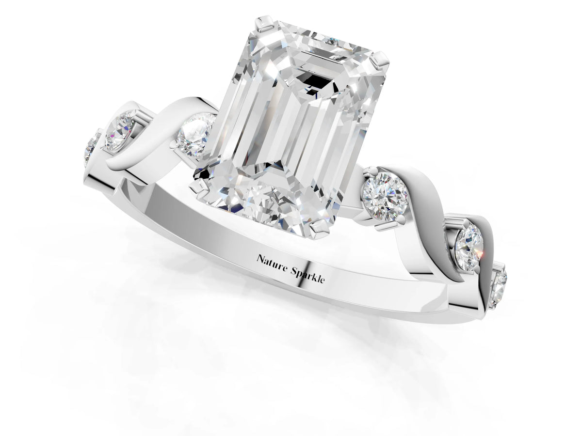 White gold Emerald Cut Diamond Solitaire Twisted Band with Round Accents and Prong Setting_1