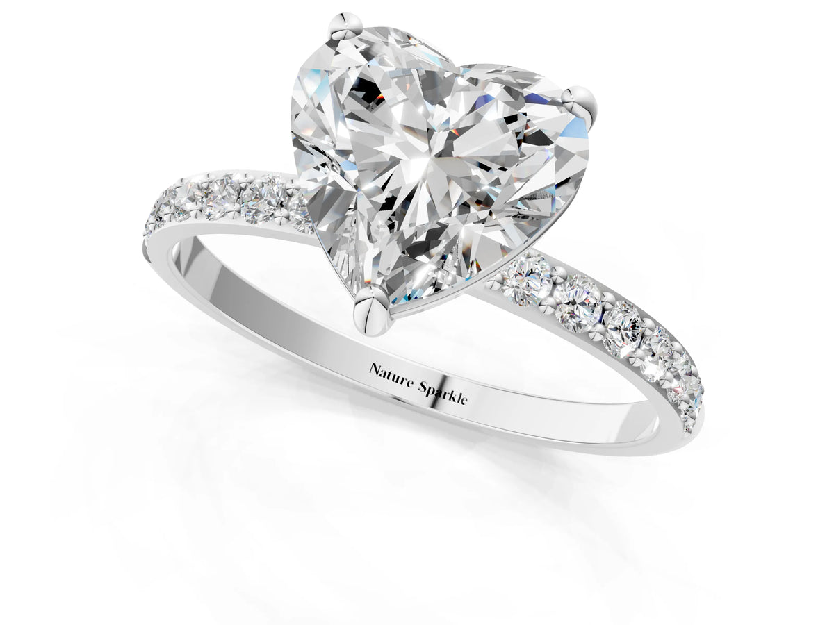 White gold Heart Cut Diamond Solitaire Ring with Round Moissanite Pavé Band and Prong Setting_1