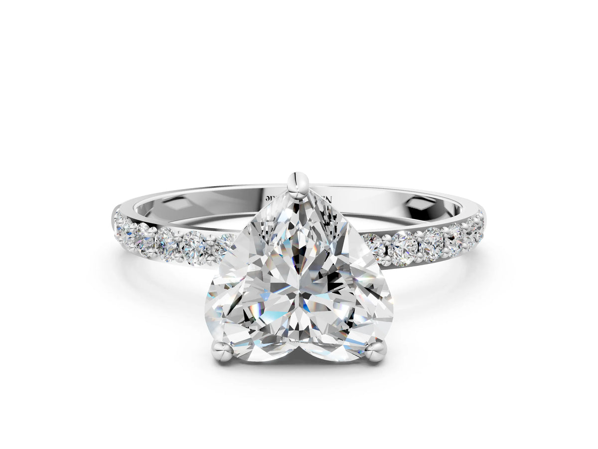 White gold Heart Cut Diamond Solitaire Ring with Round Moissanite Pavé Band and Prong Setting