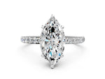 White gold Marquise Cut Diamond Solitaire Ring with Round Moissanite Pavé Band and Prong Setting