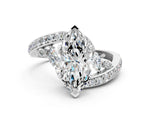 White gold Marquise Cut Solitaire with Pavé Twist Band and Four-Prong Setting