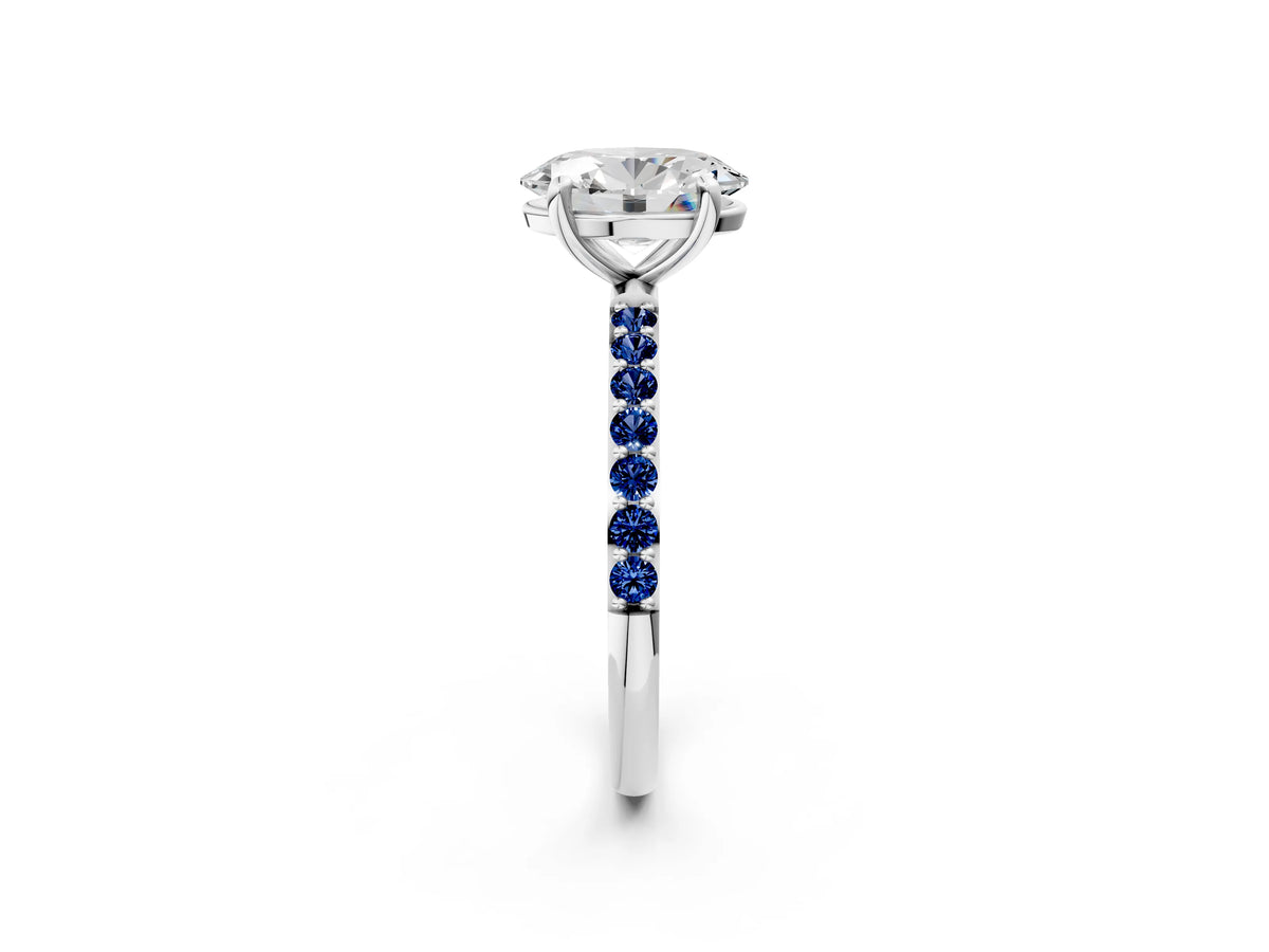 White gold Oval Cut Diamond Solitaire Ring with Round Blue Sapphire Pavé Band and Prong Setting_2