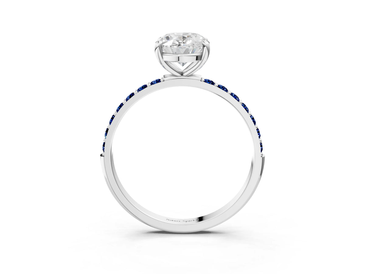 White gold Oval Cut Diamond Solitaire Ring with Round Blue Sapphire Pavé Band and Prong Setting_3