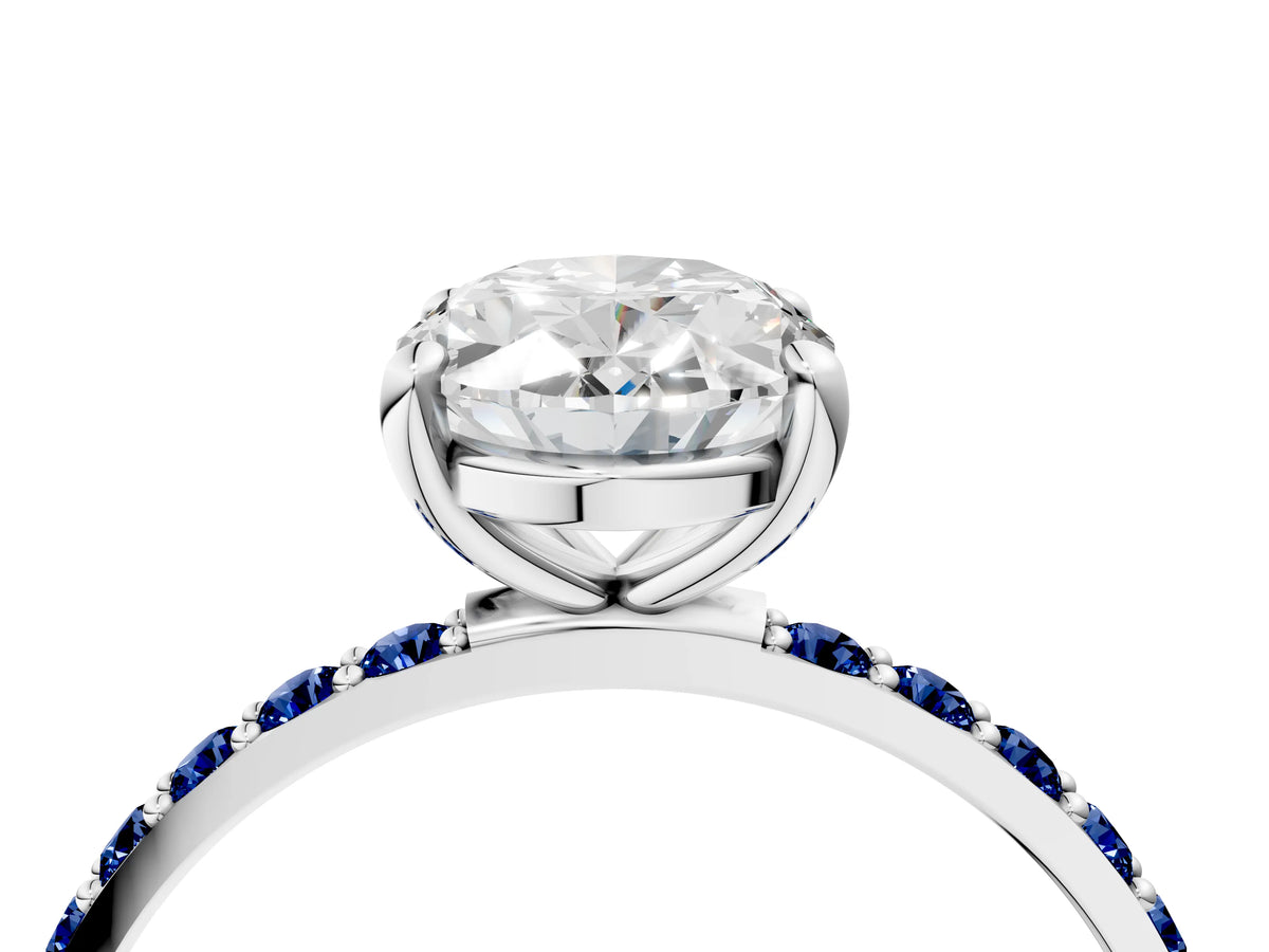 White gold Oval Cut Diamond Solitaire Ring with Round Blue Sapphire Pavé Band and Prong Setting_4