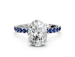 White gold Oval Cut Diamond Solitaire Ring with Round Blue Sapphire Pavé Band and Prong Setting
