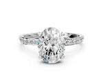 White gold Oval Cut Diamond Solitaire Ring with Round Moissanite Pavé Band and Prong Setting