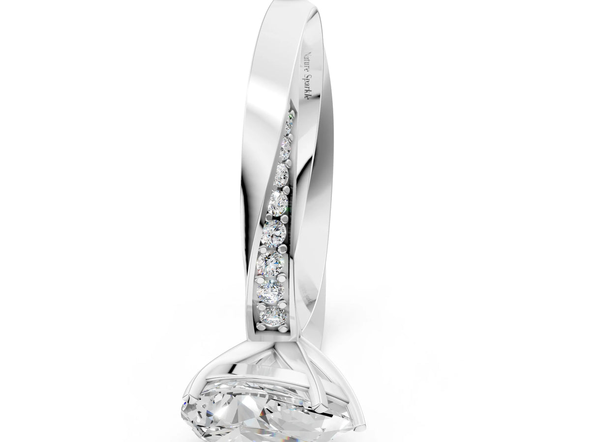 White gold Pear Cut Diamond Engagement Ring with Side Stone Accents and Four-Prong Setting