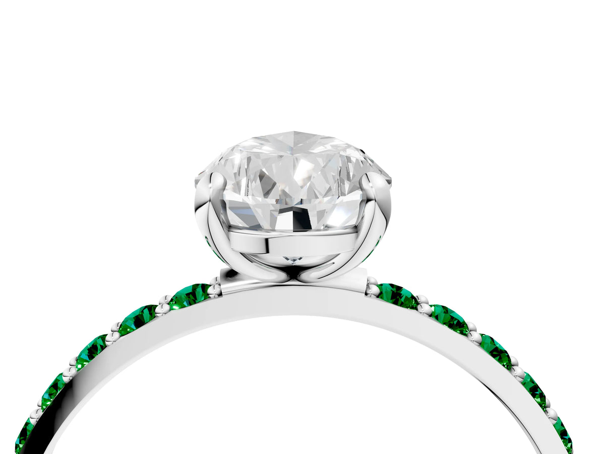 White gold Pear Cut Diamond Solitaire Ring with Round Emerald Pavé Band and Prong Setting_4