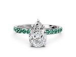 White gold Pear Cut Diamond Solitaire Ring with Round Green Sapphire Pavé Band and Prong Setting