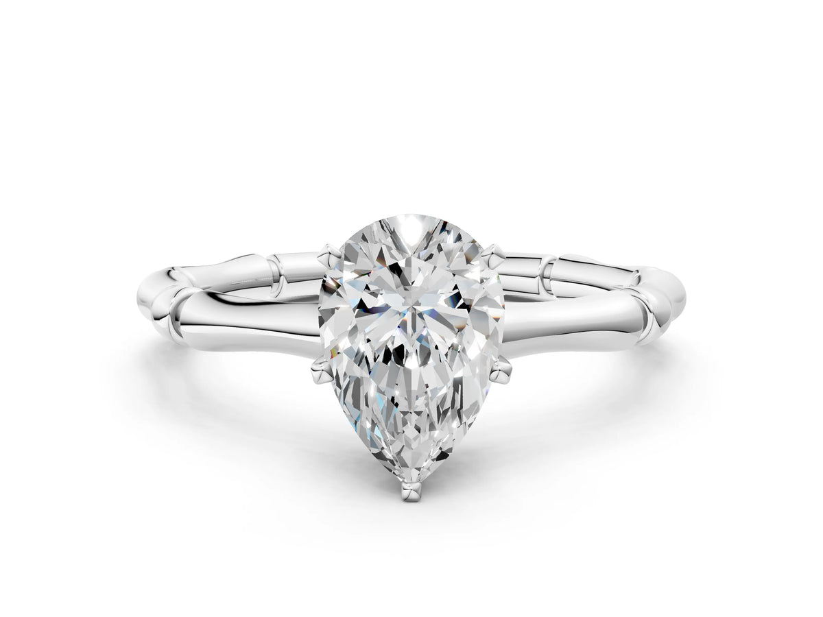 White gold Pear Cut Solitaire Diamond Ring with Bamboo Band and Four-Prong Setting