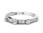 White gold Round Diamond Channel Set Eternity Band with Prong Setting