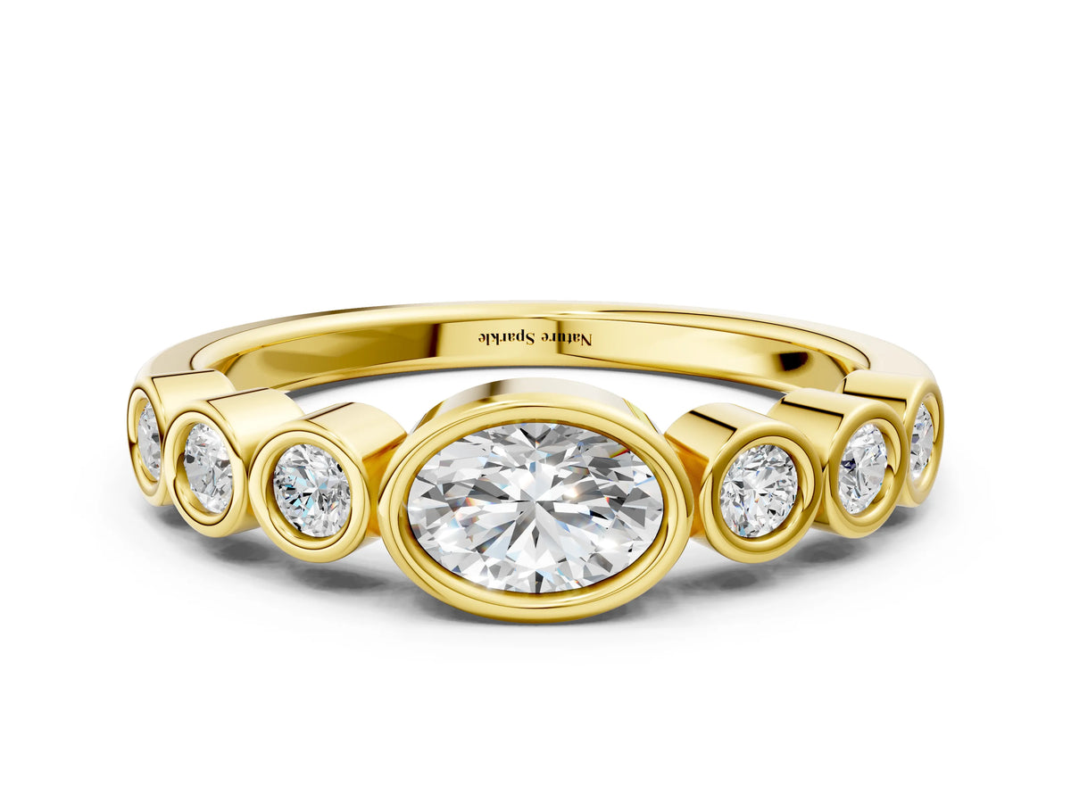 Yellow gold Bezel Set Oval Diamond Half Eternity Band