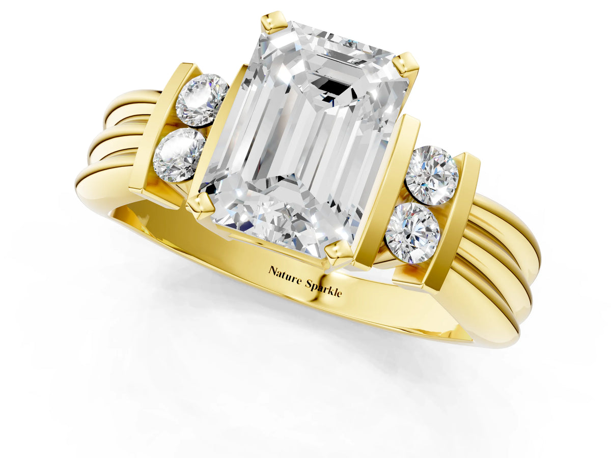 Yellow gold Emerald Cut Cut Three-Stone Channel Set Ring with Bar Prongs_1