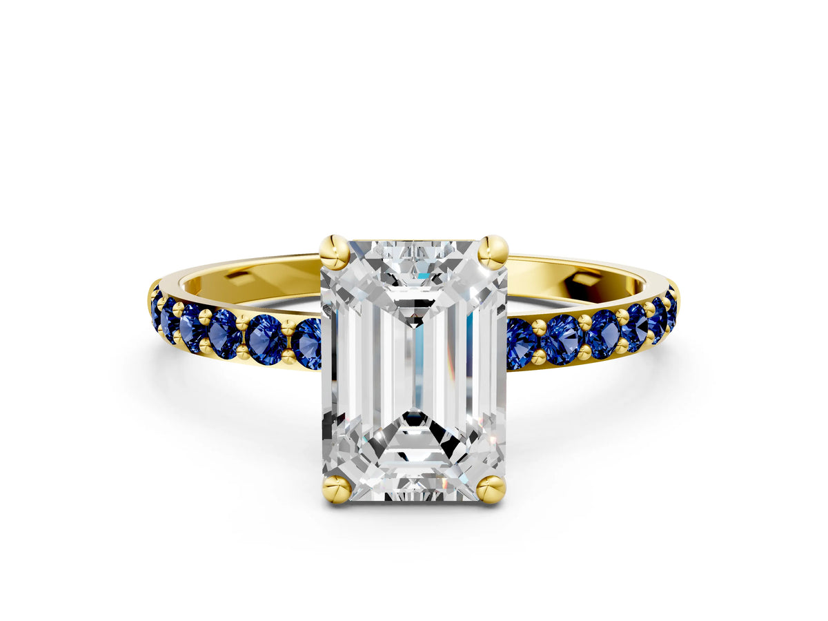 Yellow gold Emerald Cut Diamond Solitaire Ring with Round Blue Sapphire Pavé Band and Prong Setting