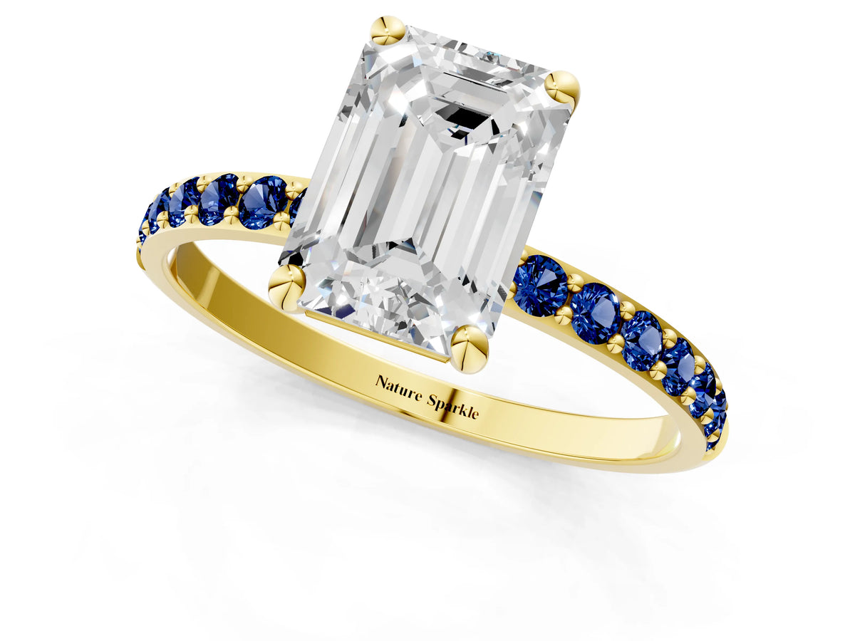 Yellow gold Emerald Cut Diamond Solitaire Ring with Round Blue Sapphire Pavé Band and Prong Setting_1