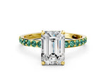 Yellow gold Emerald Cut Diamond Solitaire Ring with Round Green Sapphire Pavé Band and Prong Setting