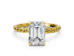 Yellow gold Emerald Cut Diamond Solitaire Ring with Round Yellow Sapphire Pavé Band and Prong Setting